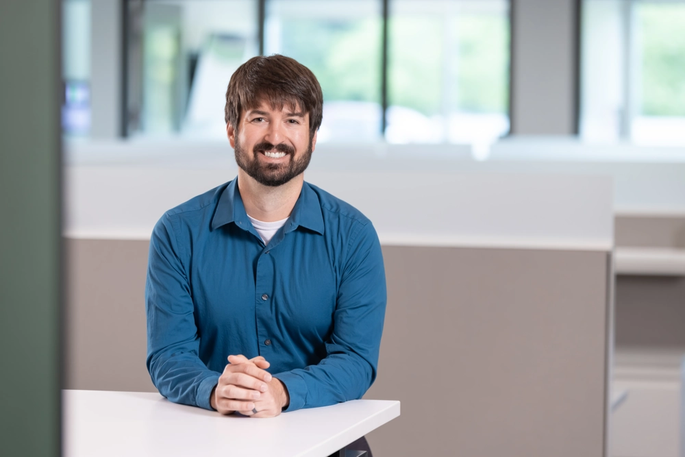 portrait of a smiling person in professional attire